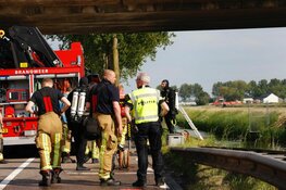Auto te water in Hoofddorp, twee gewonden