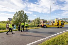 Gezin te water met auto in Hoofddorp