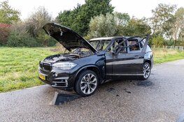 Hybride auto in brand in Halfweg