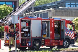 Brandje in trailer van vrachtwagen bij school in Hoofddorp
