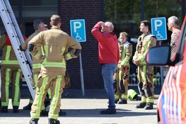Brandje in trailer van vrachtwagen bij school in Hoofddorp