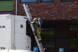 Brandje in trailer van vrachtwagen bij school in Hoofddorp